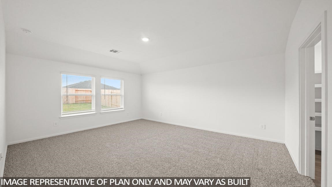 16780 Country Roots Avenue Conroe, TX 77302 - Photo 12 of 25 an empty room with a window