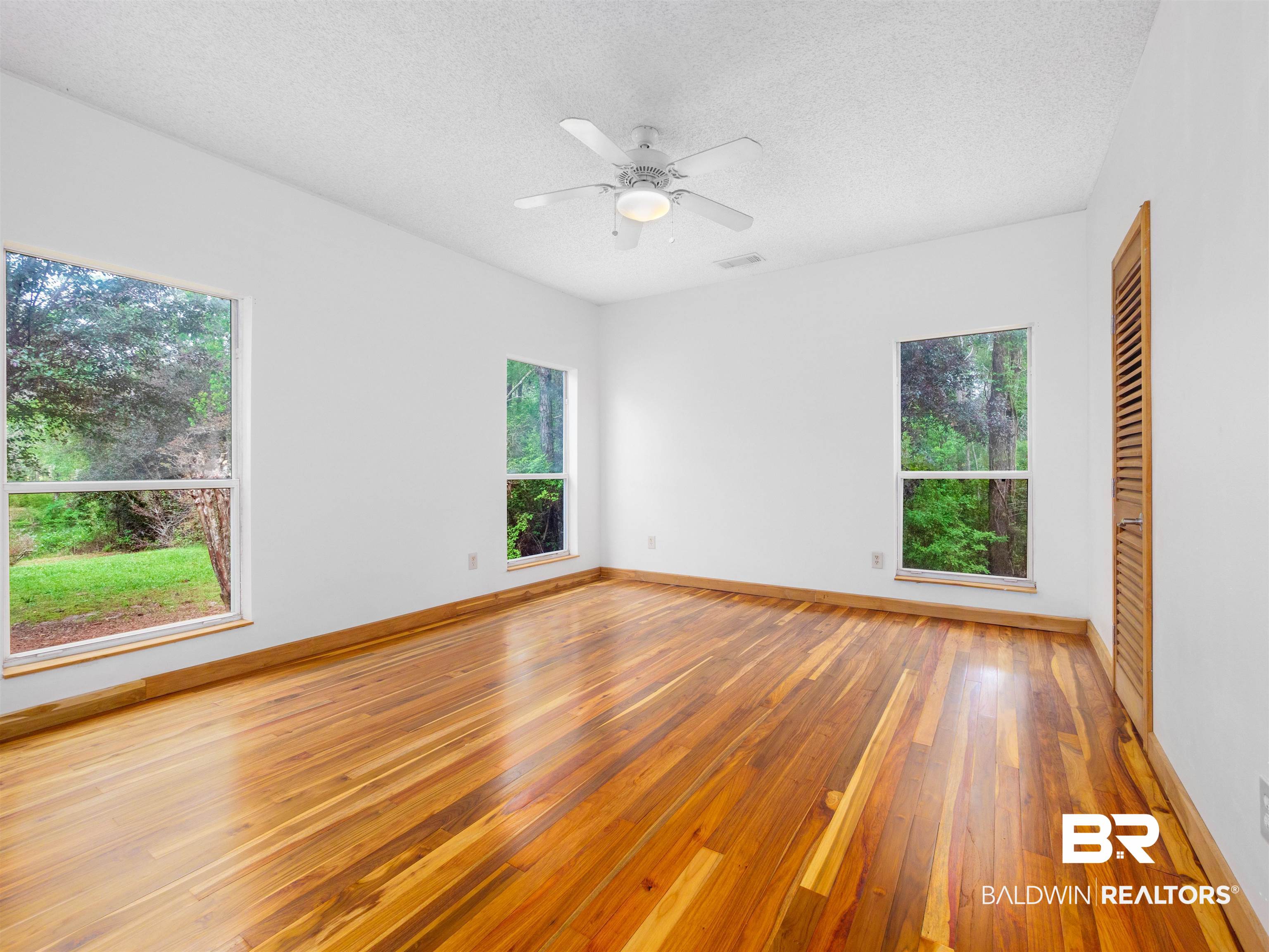 12831 Clay City Road Fairhope, AL 36532 - Photo 19 of 47 Secondary ensuite, BR 3, had teak floors & doors