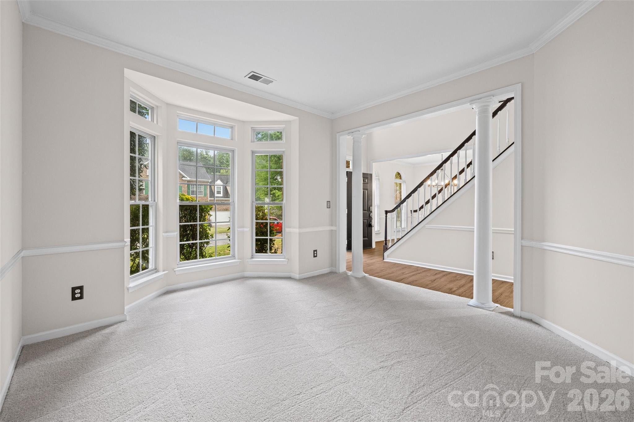 620 East Cheval Drive Fort Mill, SC 29708 - Photo 7 of 48 a view of an empty room with stairs