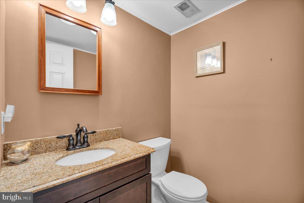 27 Spring Mill Drive Sewell, NJ 08080 - Photo 19 of 34 Chic bathroom with warm tones.