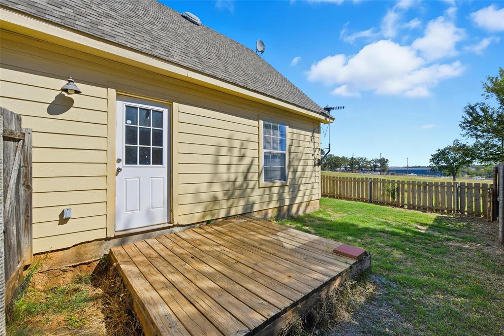 213 Private Road 4573, Unit 228 Boyd, TX 76023 - Photo 23 of 23 a view of a backyard