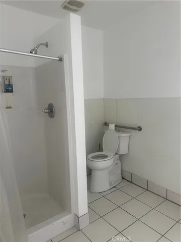 a view of a room with lot of furniture and toys