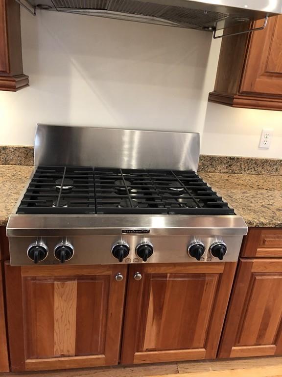 75 Old Farm Road Wellesley, MA 02481 - Photo 11 of 28 a stove top oven sitting inside of a kitchen