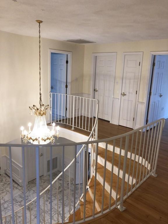 75 Old Farm Road Wellesley, MA 02481 - Photo 17 of 28 a view of a balcony with wooden floor
