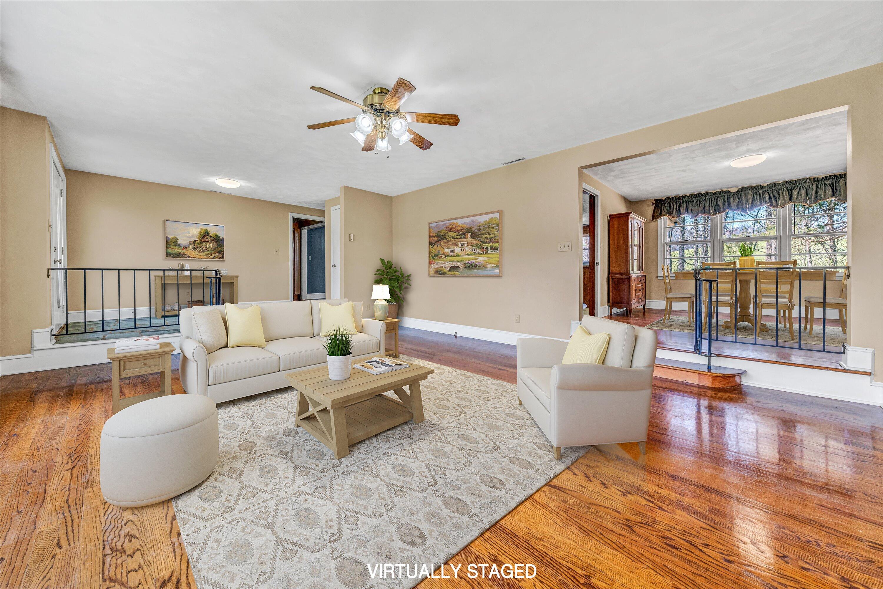 90 Campbellwood Road Boones Mill, VA 24065 - Photo 1 of 38 a living room with furniture and a large window