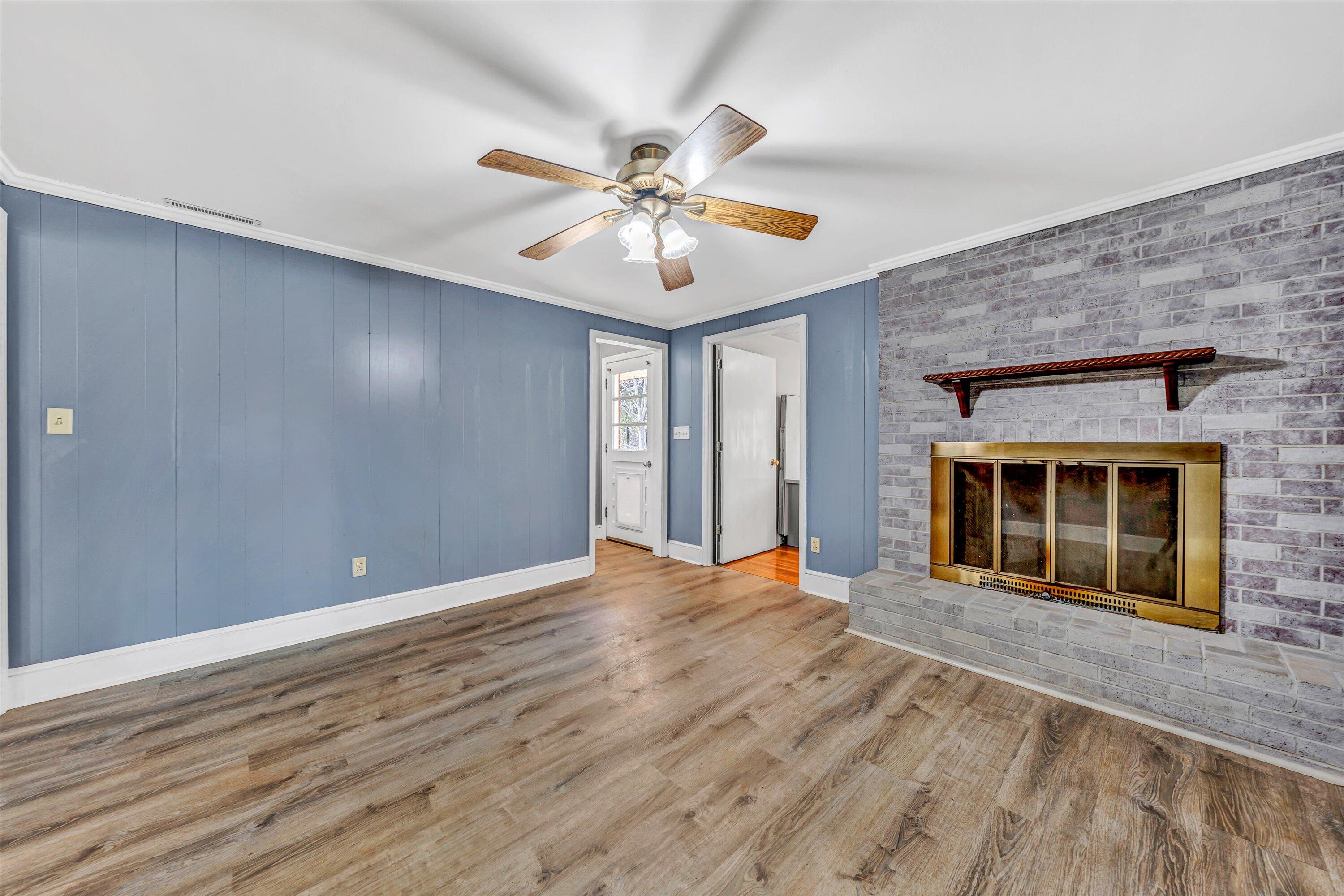 90 Campbellwood Road Boones Mill, VA 24065 - Photo 13 of 38 a view of an empty room with window and chandelier fan