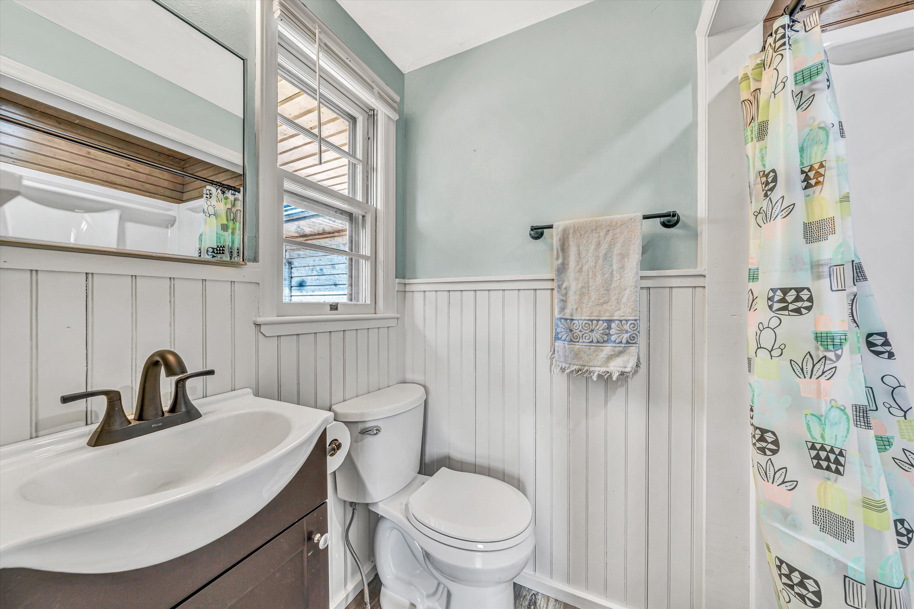 90 Campbellwood Road Boones Mill, VA 24065 - Photo 18 of 38 a bathroom with a toilet sink and mirror