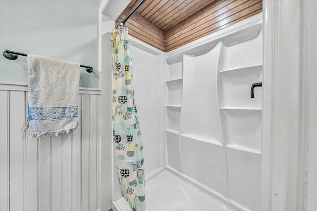 a view of a livingroom with wooden floor