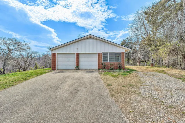 a view of a yard with an outdoor space