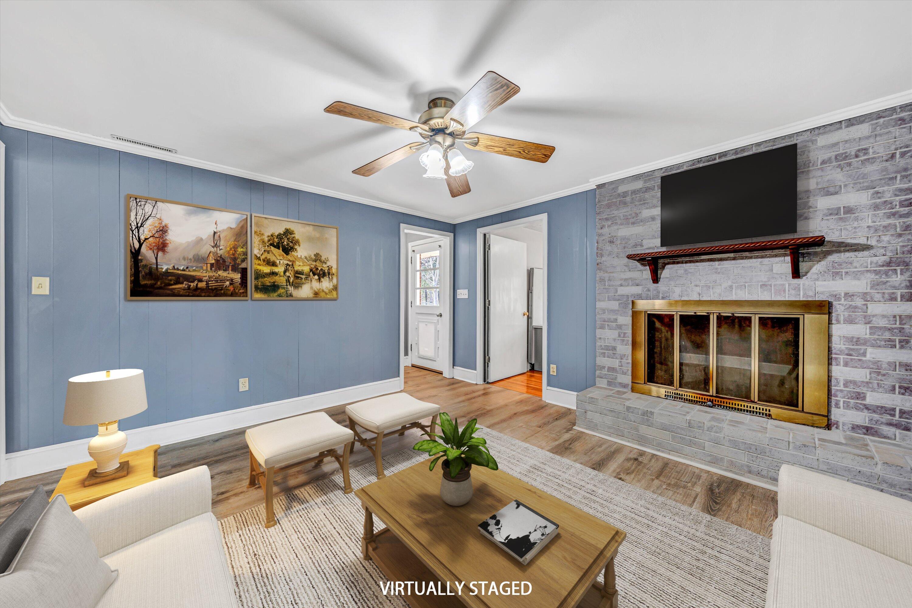 90 Campbellwood Road Boones Mill, VA 24065 - Photo 4 of 38 a living room with furniture and a flat screen tv