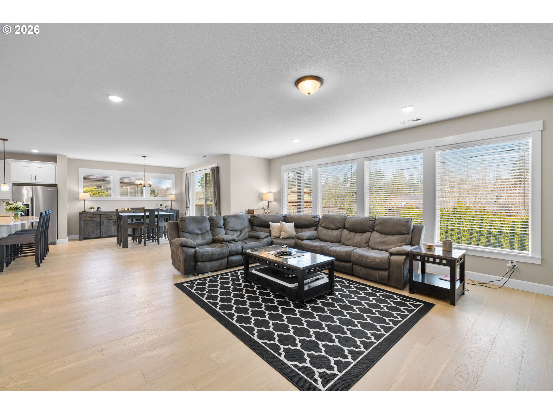 17311 Northeast 28th Court Ridgefield, WA 98642 - Photo 14 of 38 a living room with furniture and wooden floor