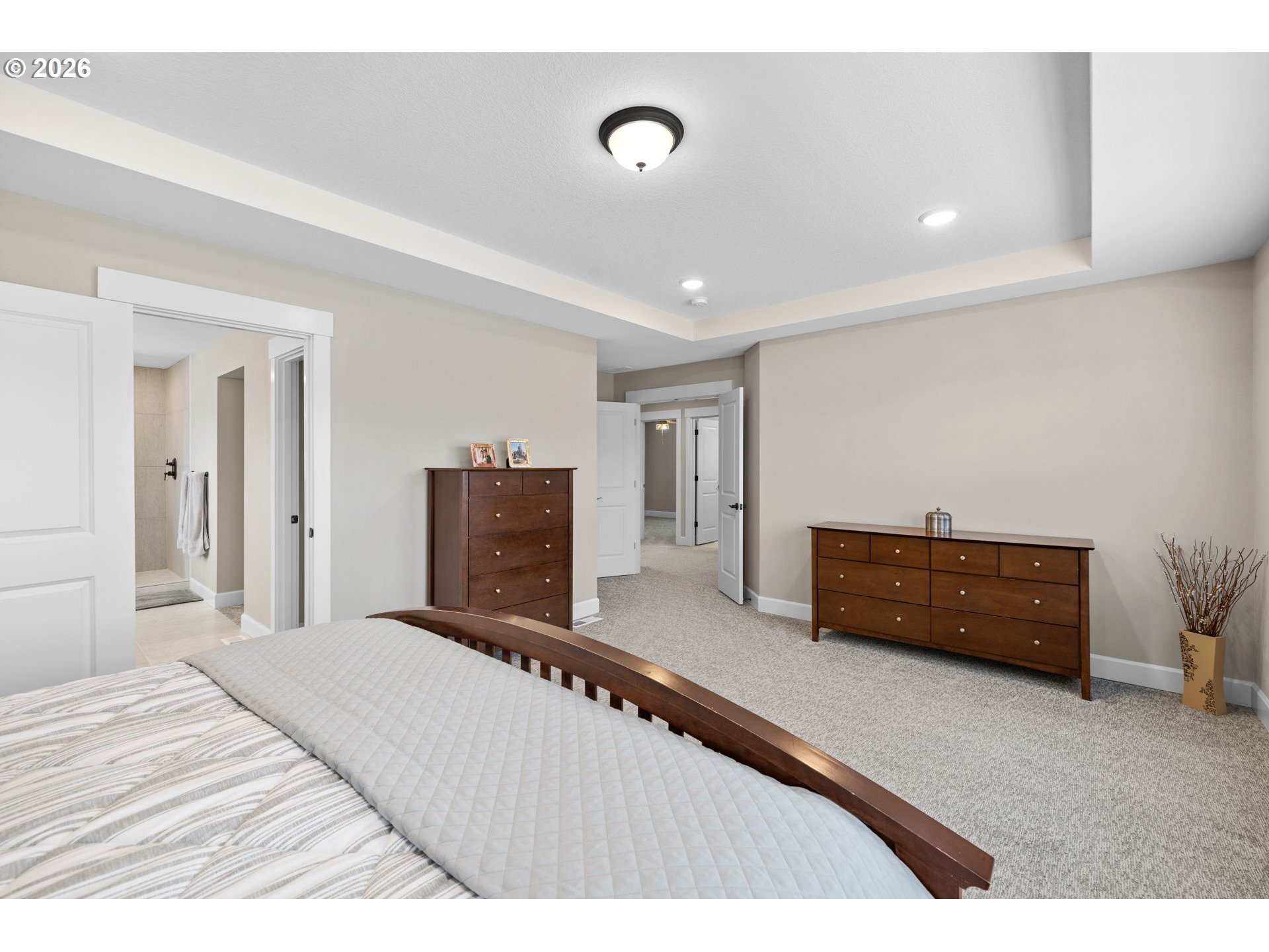 17311 Northeast 28th Court Ridgefield, WA 98642 - Photo 20 of 38 a bedroom with a bed and a dresser