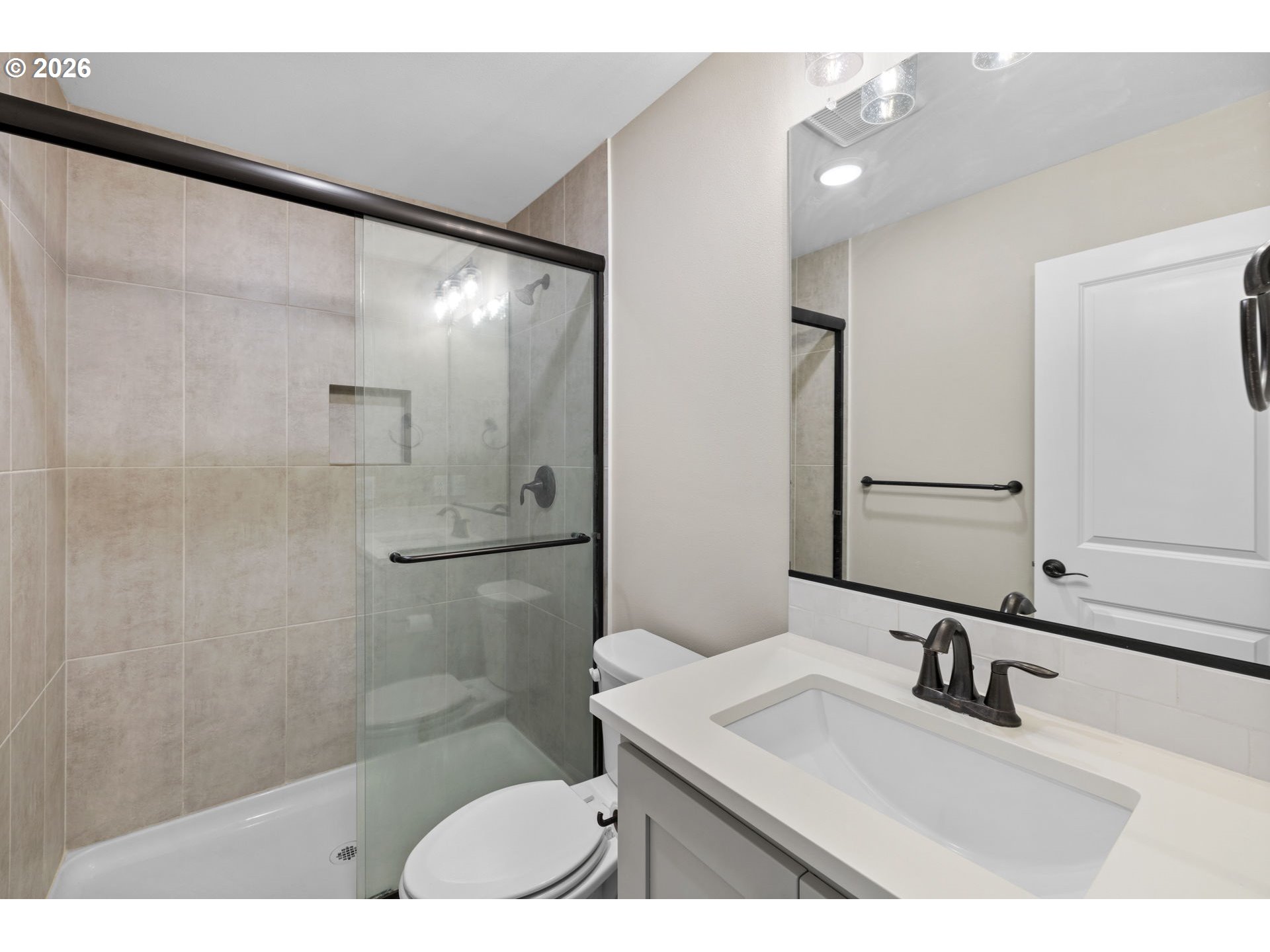 17311 Northeast 28th Court Ridgefield, WA 98642 - Photo 29 of 38 a bathroom with a sink and a mirror