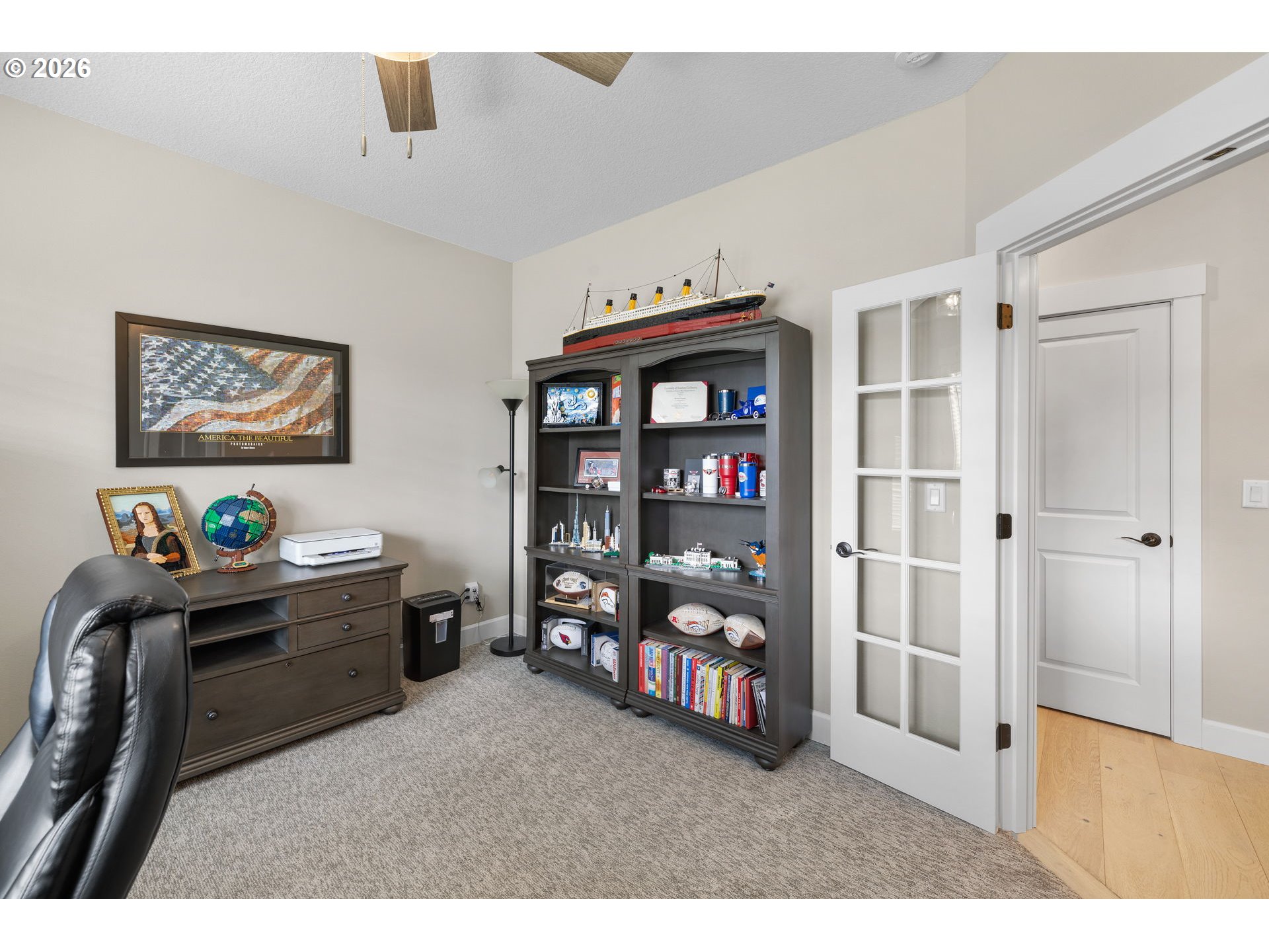17311 Northeast 28th Court Ridgefield, WA 98642 - Photo 4 of 38 a room with furniture and book shelf