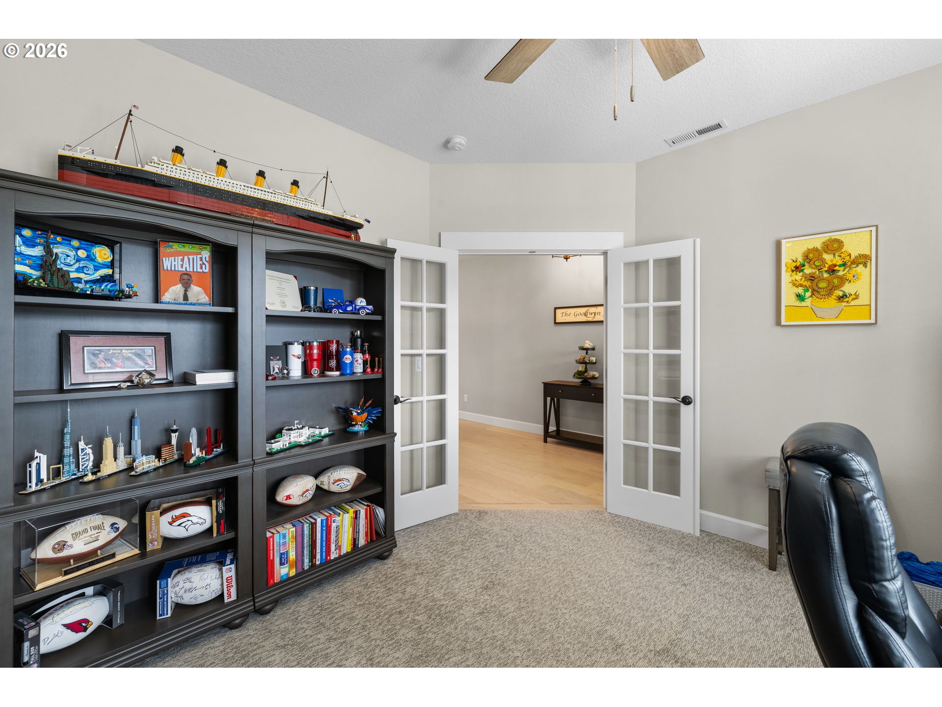 17311 Northeast 28th Court Ridgefield, WA 98642 - Photo 5 of 38 a view of a livingroom with shelves