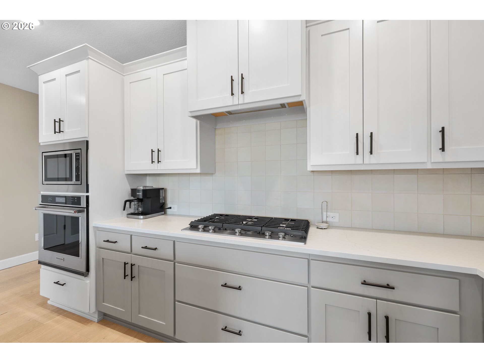 17311 Northeast 28th Court Ridgefield, WA 98642 - Photo 9 of 38 a kitchen with stainless steel appliances granite countertop a sink dishwasher stove and cabinets