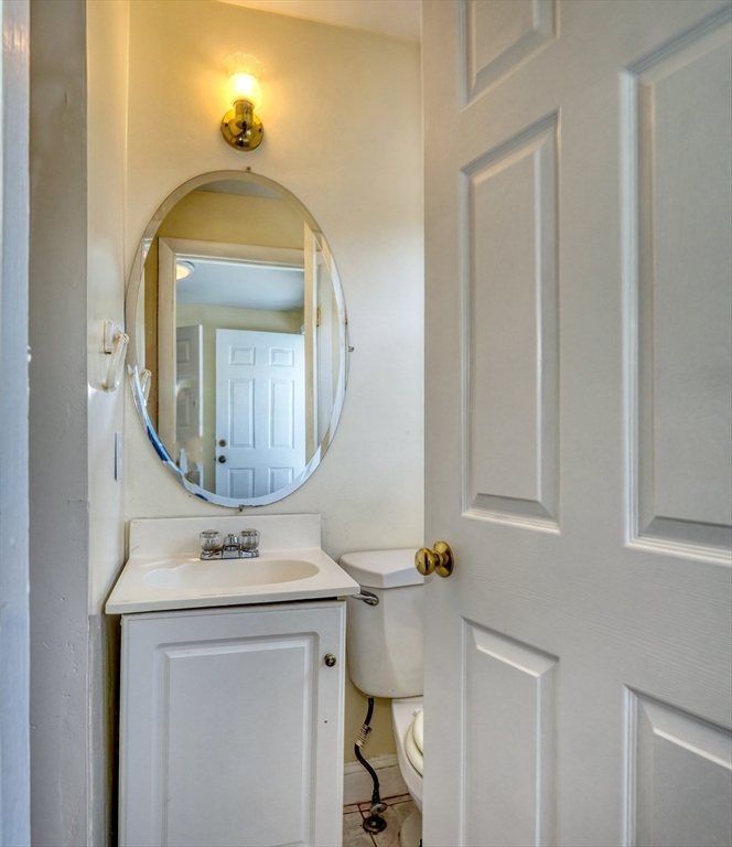 173 Overlook Road Arlington, MA 02474 - Photo 13 of 42 a bathroom with a sink and a mirror