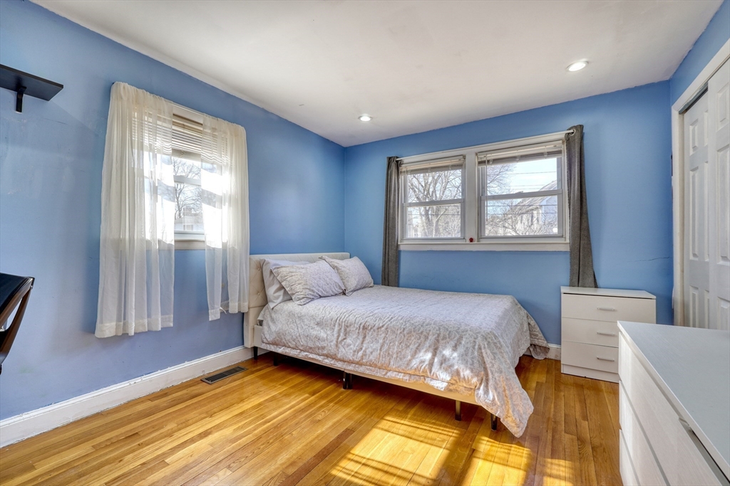 173 Overlook Road Arlington, MA 02474 - Photo 18 of 42 a bedroom with a bed and a window
