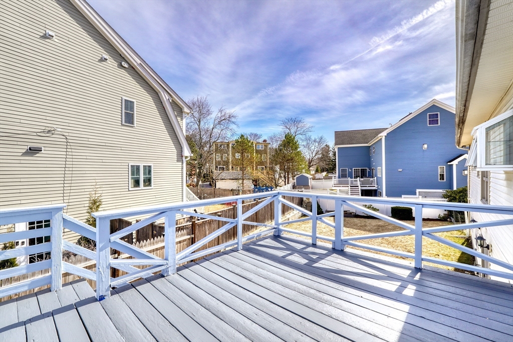 173 Overlook Road Arlington, MA 02474 - Photo 31 of 42 a view of roof deck with wooden floor and seating space