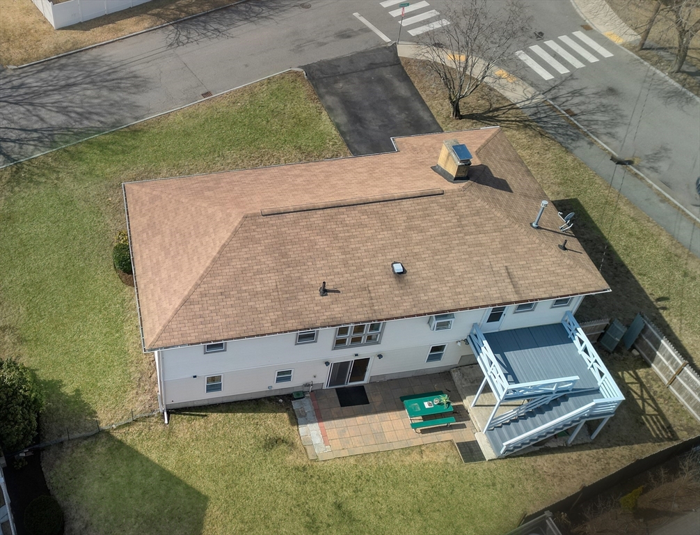 173 Overlook Road Arlington, MA 02474 - Photo 35 of 42 an aerial view of a house with a yard