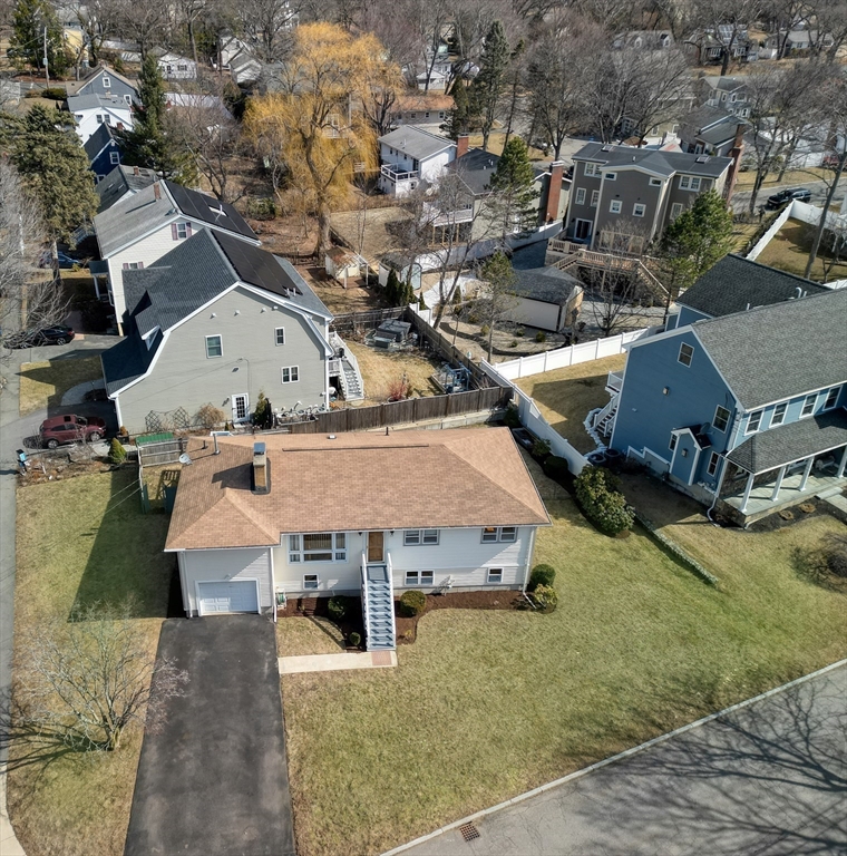 173 Overlook Road Arlington, MA 02474 - Photo 36 of 42 an aerial view of a house with a yard