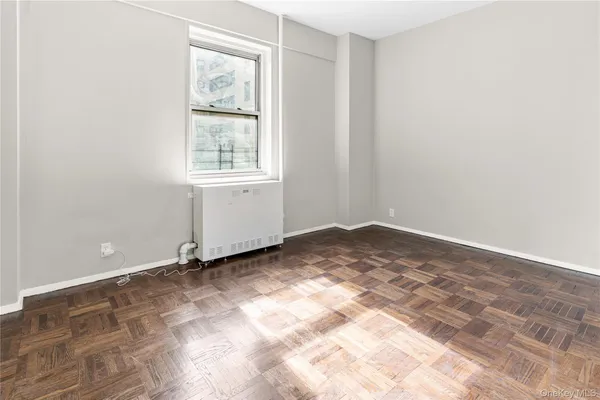 a view of a room that has a window in it