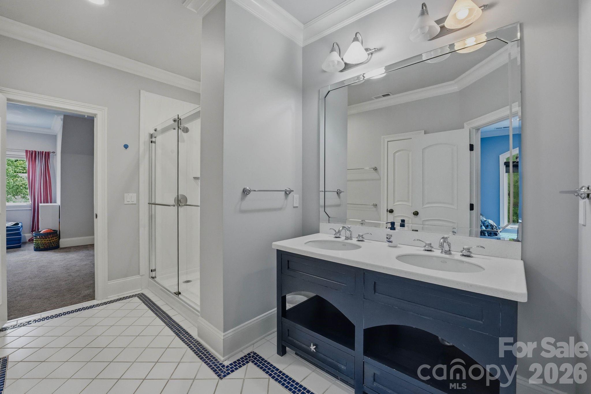 7416 Lee Rea Road Charlotte, NC 28226 - Photo 44 of 48 a bathroom with a sink double vanity and a mirror