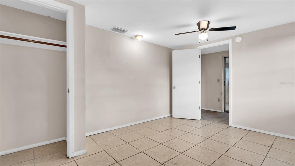 11241 Snyder Avenue Port Richey, FL 34668 - Photo 16 of 24 a view of an empty room