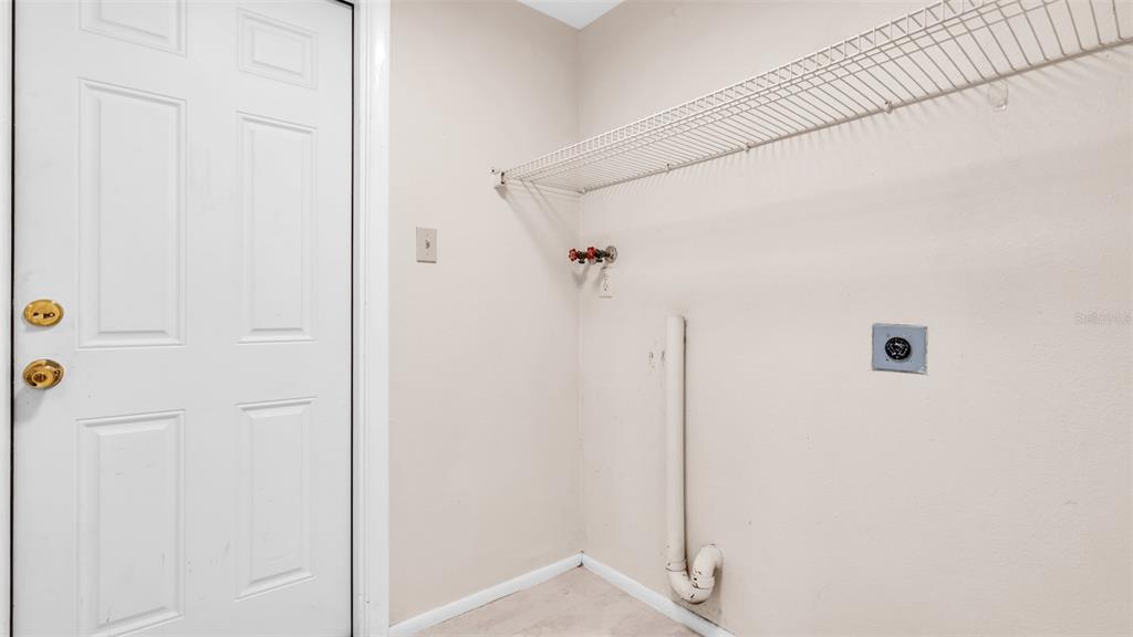 11241 Snyder Avenue Port Richey, FL 34668 - Photo 20 of 24 a bathroom with a shower