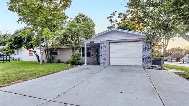 a house view with a garden space
