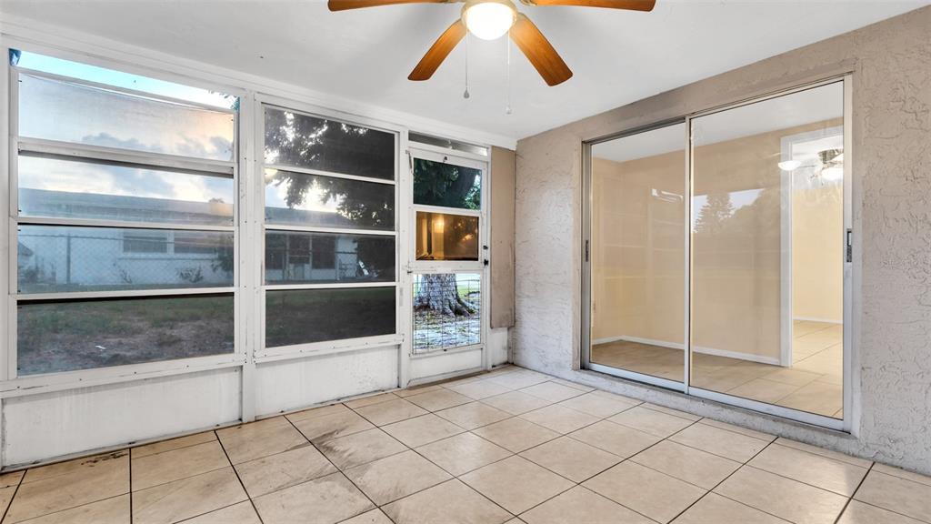 11241 Snyder Avenue Port Richey, FL 34668 - Photo 23 of 24 a view of an empty room and window