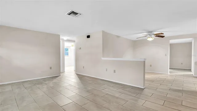a view of a kitchen with electric appliances
