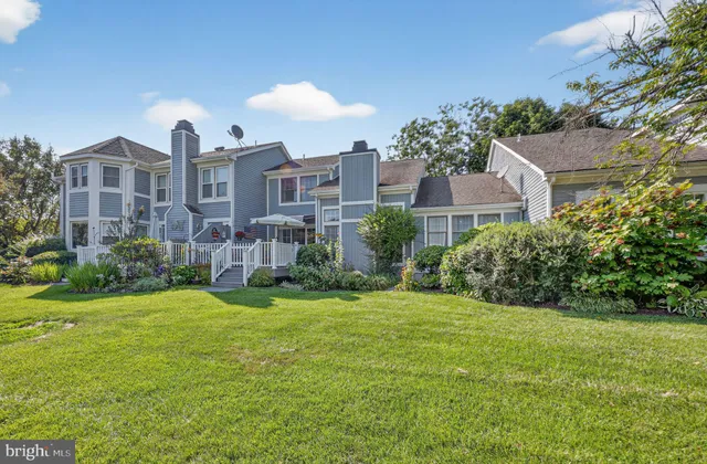 a view of a building with a yard