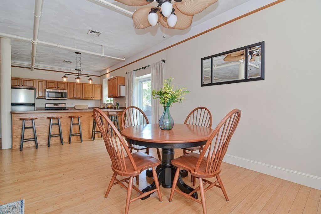 200 Cato Street, Unit 7 Woonsocket, RI 02895 - Photo 13 of 39 a dining room with furniture and window