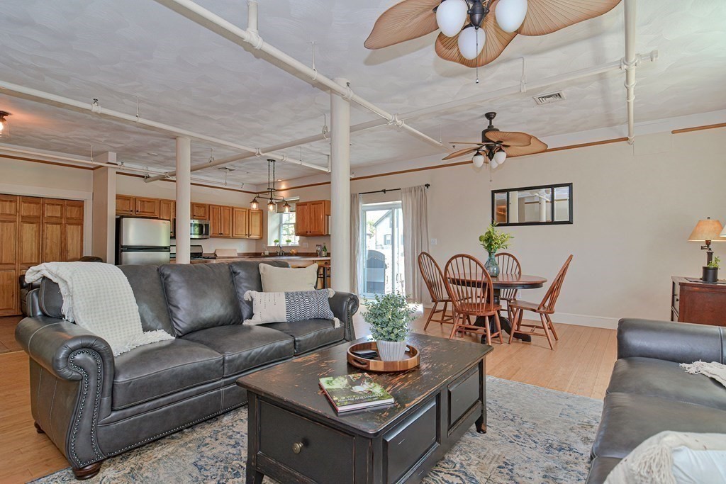 200 Cato Street, Unit 7 Woonsocket, RI 02895 - Photo 19 of 39 a living room with furniture and a table