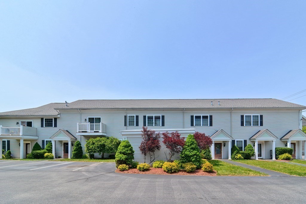 200 Cato Street, Unit 7 Woonsocket, RI 02895 - Photo 37 of 39 a front view of house with yard and green space