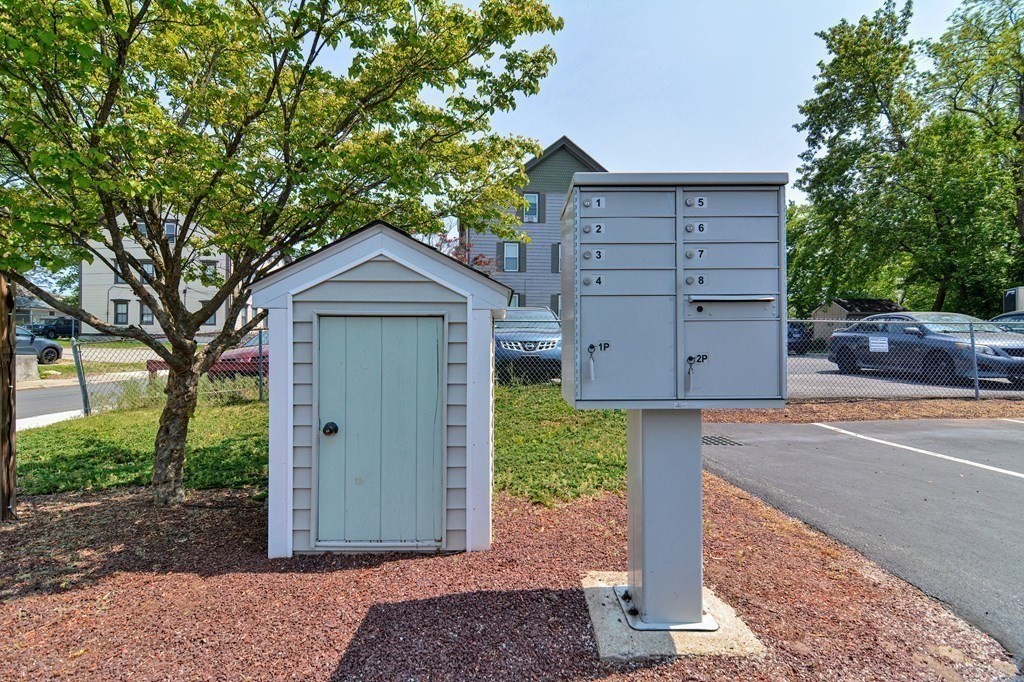 200 Cato Street, Unit 7 Woonsocket, RI 02895 - Photo 39 of 39 a view of a house with a garden