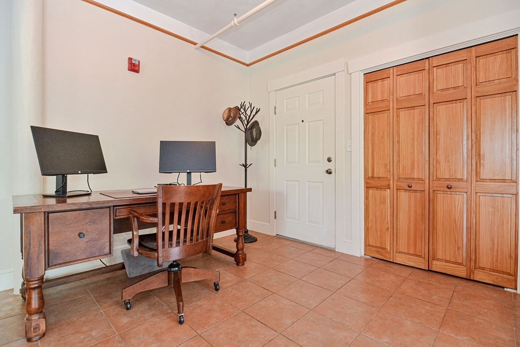 200 Cato Street, Unit 7 Woonsocket, RI 02895 - Photo 8 of 39 a view of a workspace with furniture
