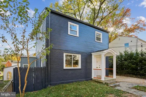 a bathroom with a sink vanity and a mirror