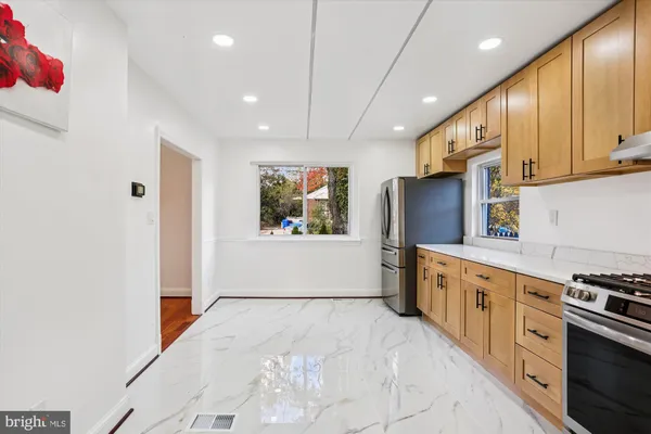 a view of entryway with wooden floor