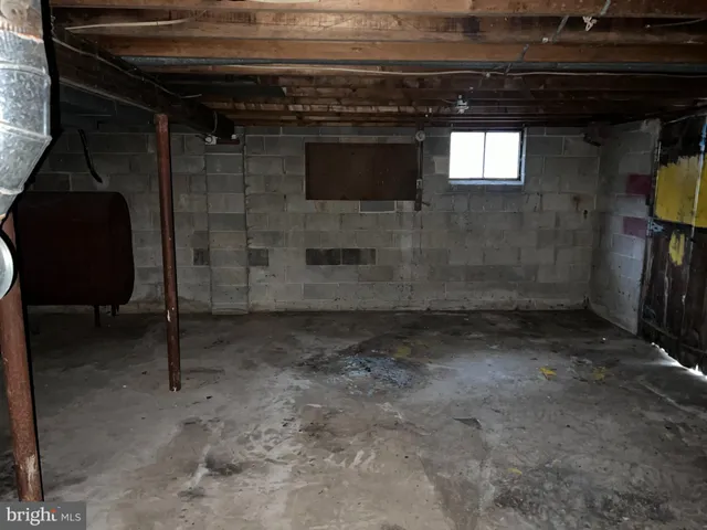 a view of a house with a yard and a garage