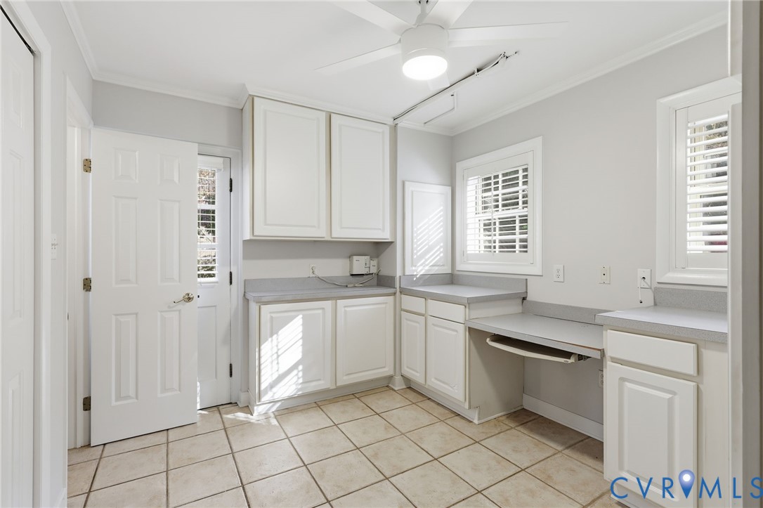 8810 Wishart Road Henrico, VA 23229 - Photo 37 of 49 Laundry room storage and workspace.