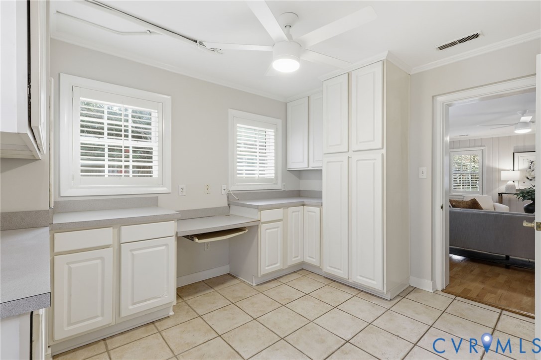8810 Wishart Road Henrico, VA 23229 - Photo 38 of 49 Laundry room storage and workspace.