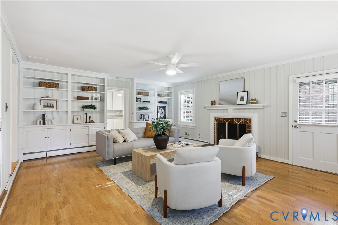 8810 Wishart Road Henrico, VA 23229 - Photo 6 of 49 A large family room with built-in bookcases and wo