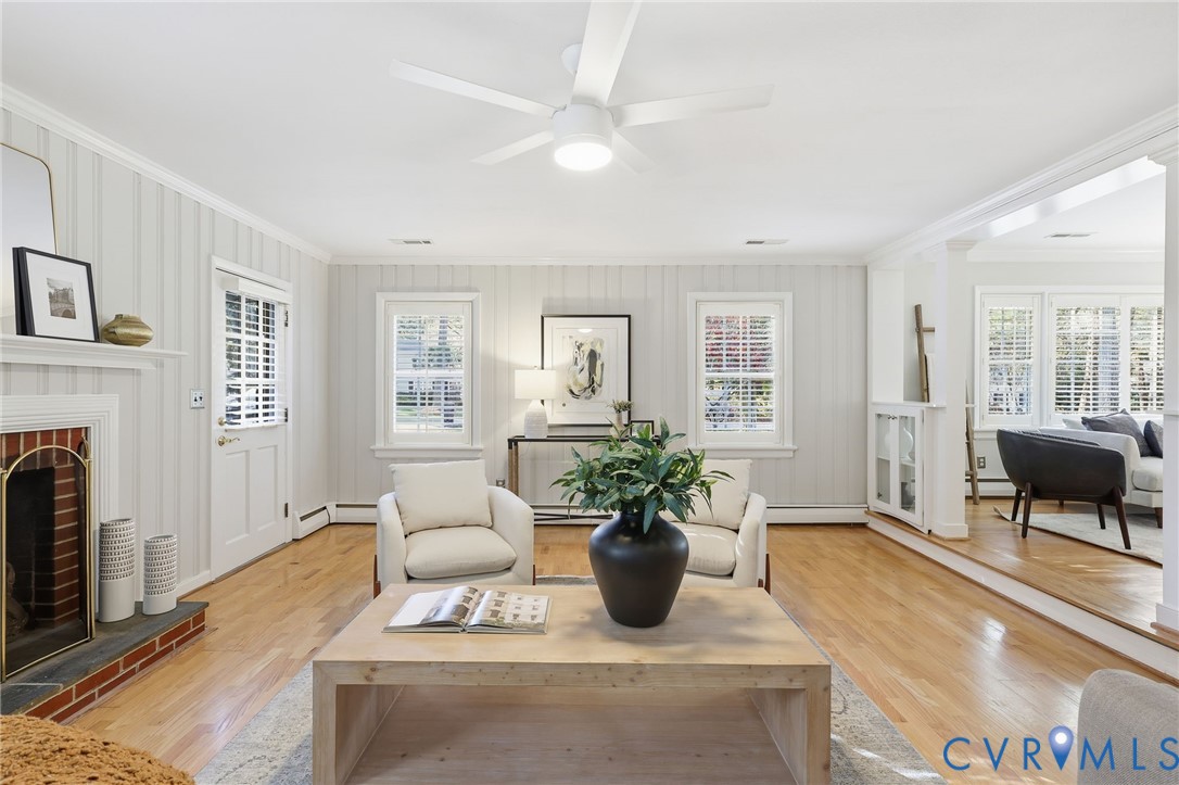 8810 Wishart Road Henrico, VA 23229 - Photo 10 of 49 A large family room with built-in bookcases and wo