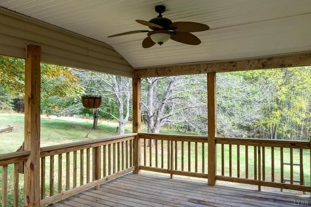a view of porch with furniture and a window