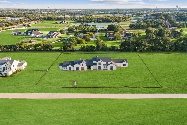 an aerial view of a play ground with a yard