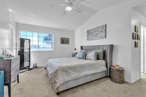14817 Balgowan Road, Unit 2015 Miami Lakes, FL 33016 - Photo 11 of 39 a bedroom with a bed and a window