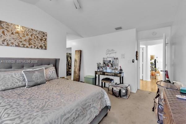 14817 Balgowan Road, Unit 2015 Miami Lakes, FL 33016 - Photo 12 of 39 a bedroom with bed and a furniture