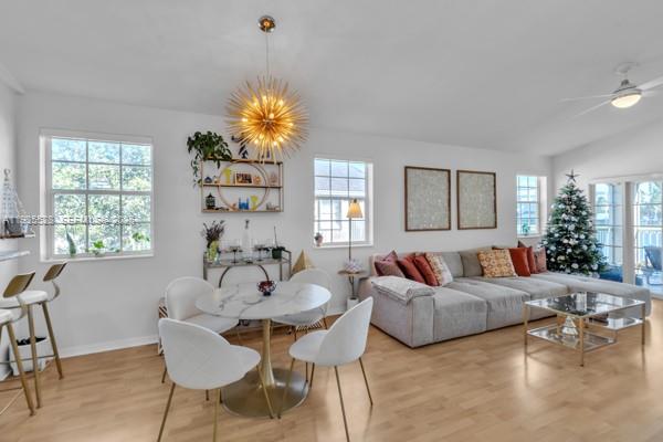 14817 Balgowan Road, Unit 2015 Miami Lakes, FL 33016 - Photo 17 of 39 a living room with furniture and a large window